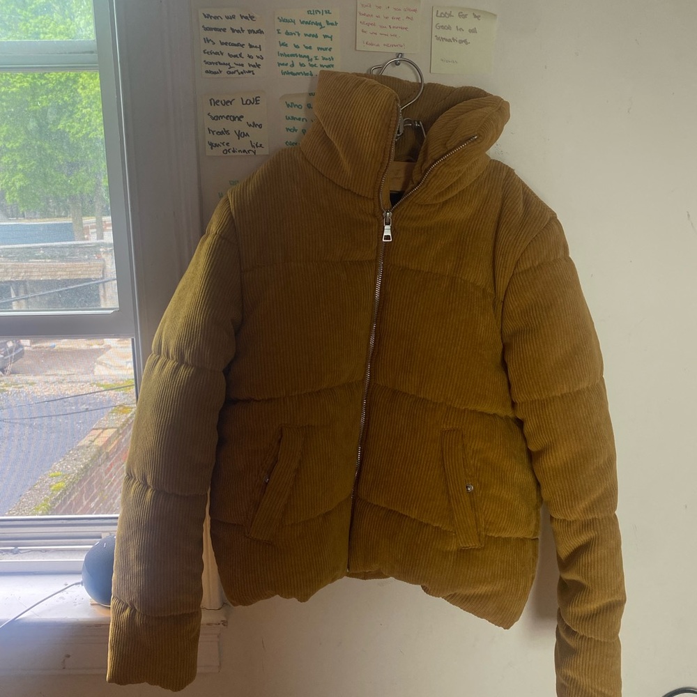 Yellow puffer jacket